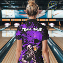 Load image into Gallery viewer, Person wearing a bowling shirt with a skeleton design and 'TEAM NAME' text in a bowling alley.
