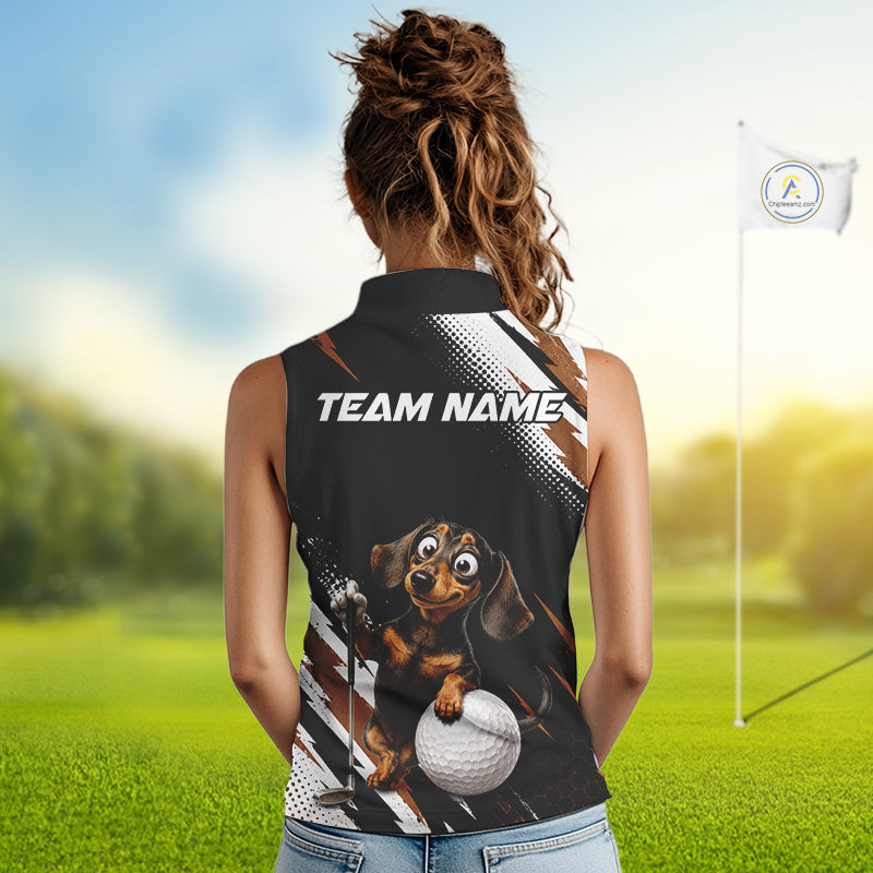 A woman viewed from behind wearing a sleeveless black polo shirt with a custom dachshund graphic and 'TEAM NAME' text, set against a blurred golf course background with a flag.
