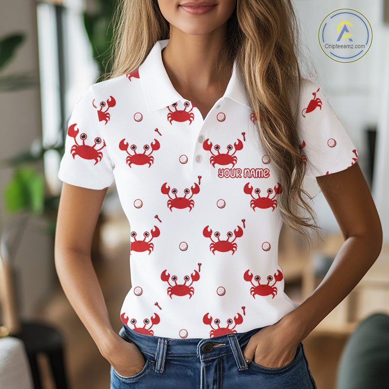 Woman wearing a white polo shirt with red crab patterns and customizable text.