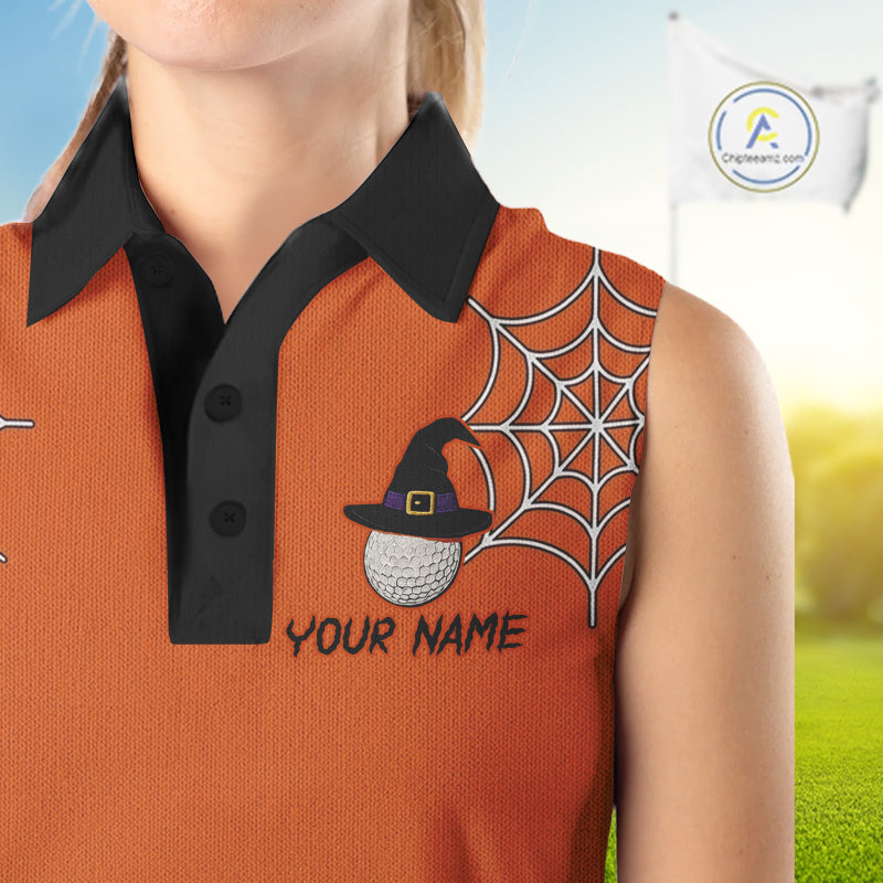 A sleeveless orange polo shirt with a black collar and buttons, featuring a custom Halloween-themed graphic of a witch hat on a golf ball, a spiderweb, and the text 'YOUR NAME'.
