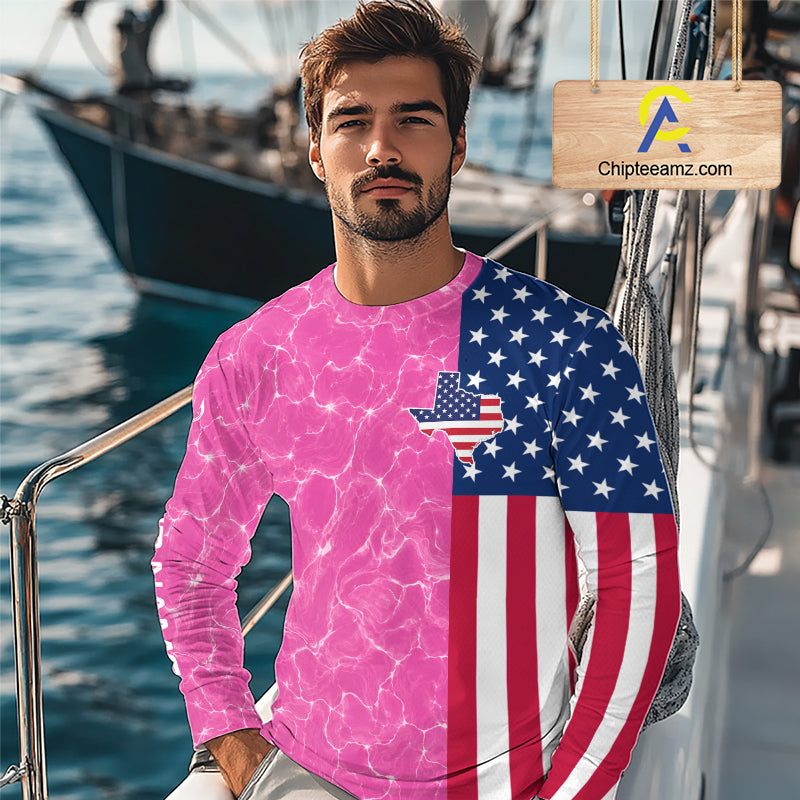 Man wearing a shirt with a pink water pattern and American flag design on a boat.