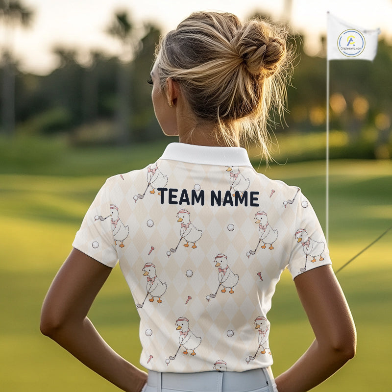 Person wearing a golf shirt with 'TEAM NAME' on the back, standing on a golf course.