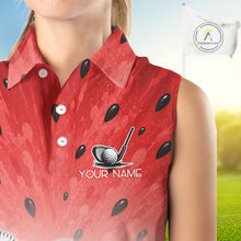 Load image into Gallery viewer, Red sleeveless shirt with black patterns and golf club design, featuring a customizable name option on a blurred golf course background.