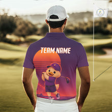 Load image into Gallery viewer, Person wearing a purple polo shirt with a cartoon duck design and 'Team Name' text on a golf course.