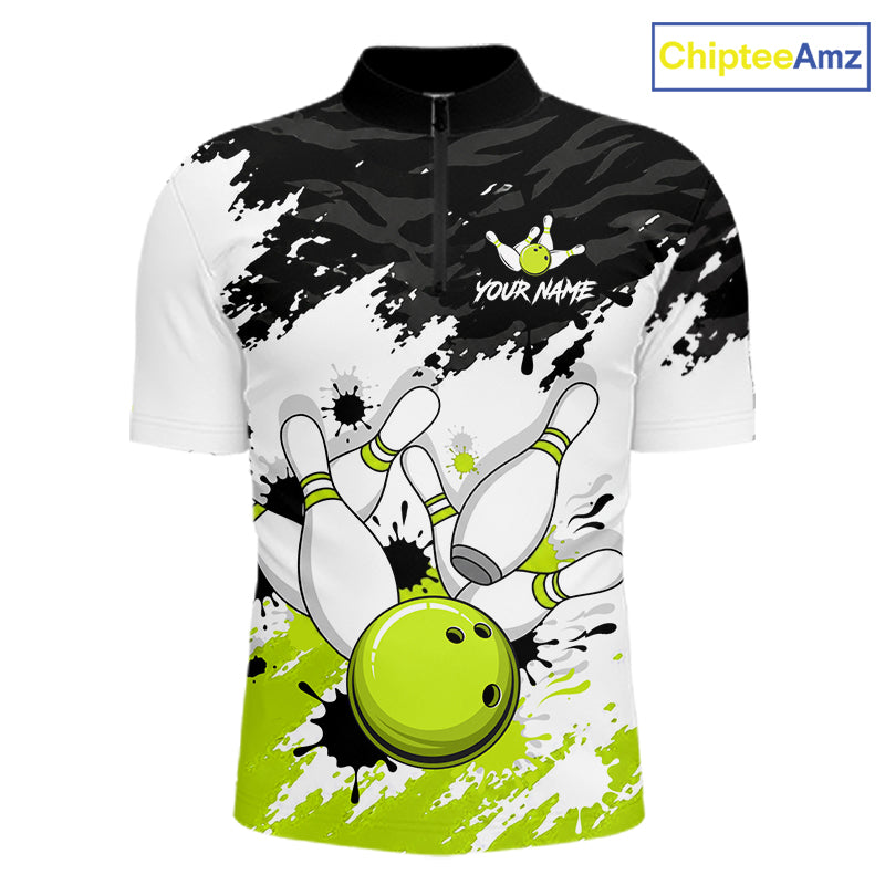 A short-sleeve quarter-zip bowling-themed polo shirt with a black and white paint-splatter background, white bowling pins, and a bright lime green bowling ball graphic. The shirt features a placeholder logo reading 'YOUR NAME' and a 'ChipteeAmz' brand watermark in the top right corner.