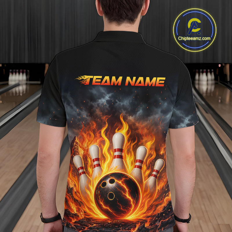 A man viewed from behind wearing a black short-sleeve polo shirt with a large bowling-themed graphic print featuring a flaming bowling ball, bowling pins, and the text 'TEAM NAME' on the back. Bowling lanes are visible in the background, and a circular 'Chipteeamz.