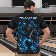 Load image into Gallery viewer, Person wearing a black bowling shirt with blue graphic design and 'TEAM NAME' text in a bowling alley.