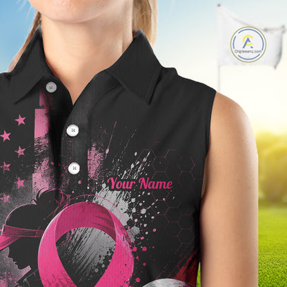 A sleeveless black polo shirt with a pink and gray graphic design, featuring a pink ribbon motif, stars, and the text 'Your Name' on the chest. The shirt is modeled on a person, with a golf course background and a logo watermark in the top right corner.