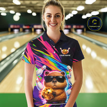 Load image into Gallery viewer, Woman wearing a colorful bowling shirt with a bear design in a bowling alley.