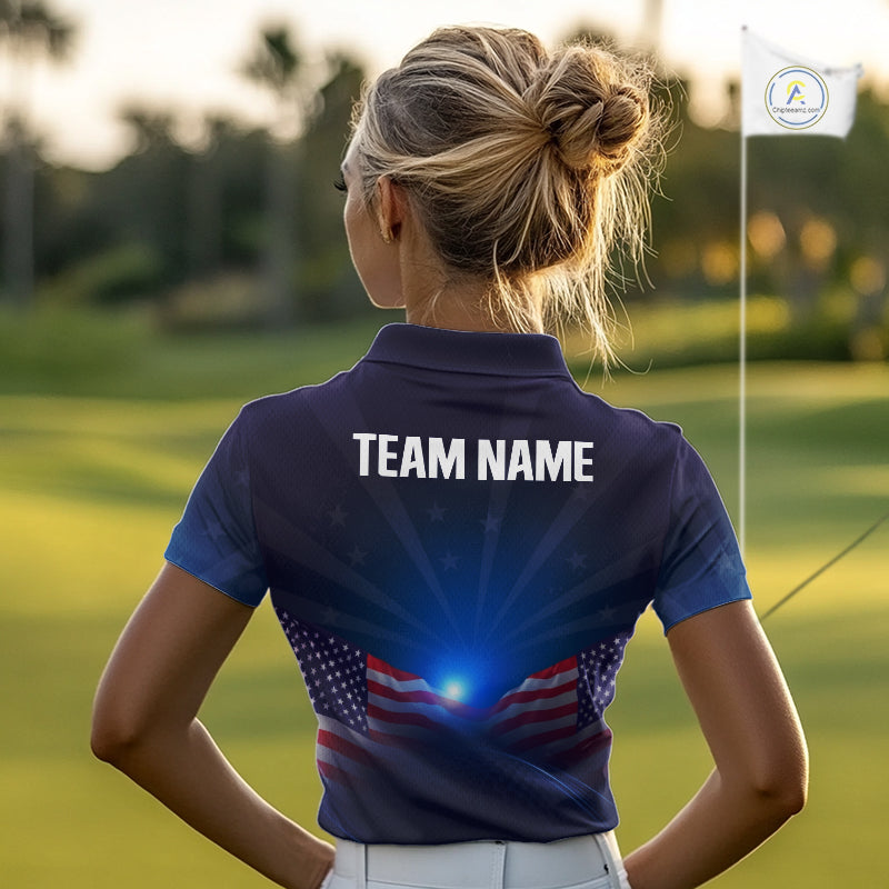 Woman on a golf course wearing a blue polo shirt with 'TEAM NAME' on the back.