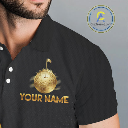 Closse-up fabric of black polo shirt with gold golf ball design and 'Your Name' text on the chest