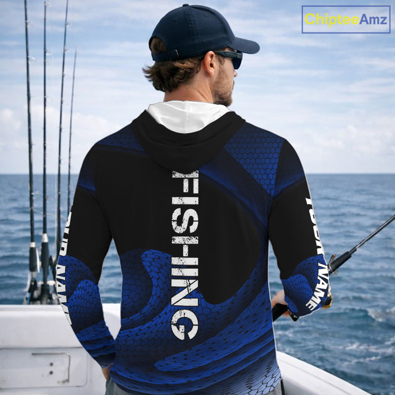 Fisherman on the water wearing custom name blue camo bass fishing long sleeve hooded shirt