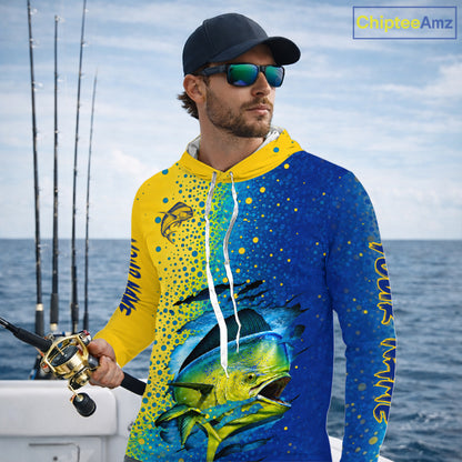 Angler wearing custom Mahi Mahi saltwater long sleeve hooded fishing shirt on a boat