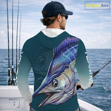 Load image into Gallery viewer, Angler wearing patriotic American Flag Marlin long sleeve hooded fishing shirt on the boat