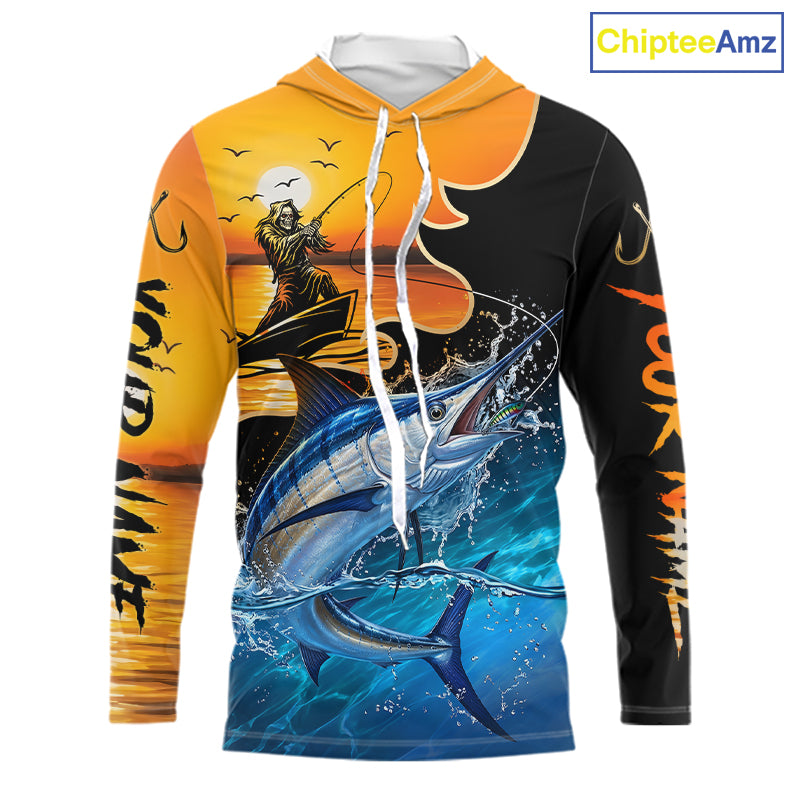 Long sleeve hooded fishing shirt with a fish reaper and marlin design on a sunset background