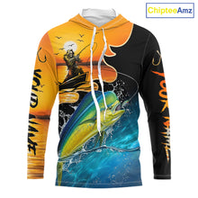 Load image into Gallery viewer, Long sleeve hooded fishing shirt with a fish reaper and mahi mahi design on a sunset background