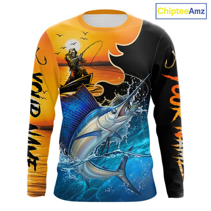 Long sleeve fishing shirt with a fisher reaper and sailfish design on an orange and black background