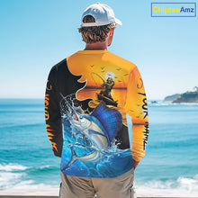 Load image into Gallery viewer, Person wearing a fish reaper sailfish fishing shirt with a sunset and fish reaper design