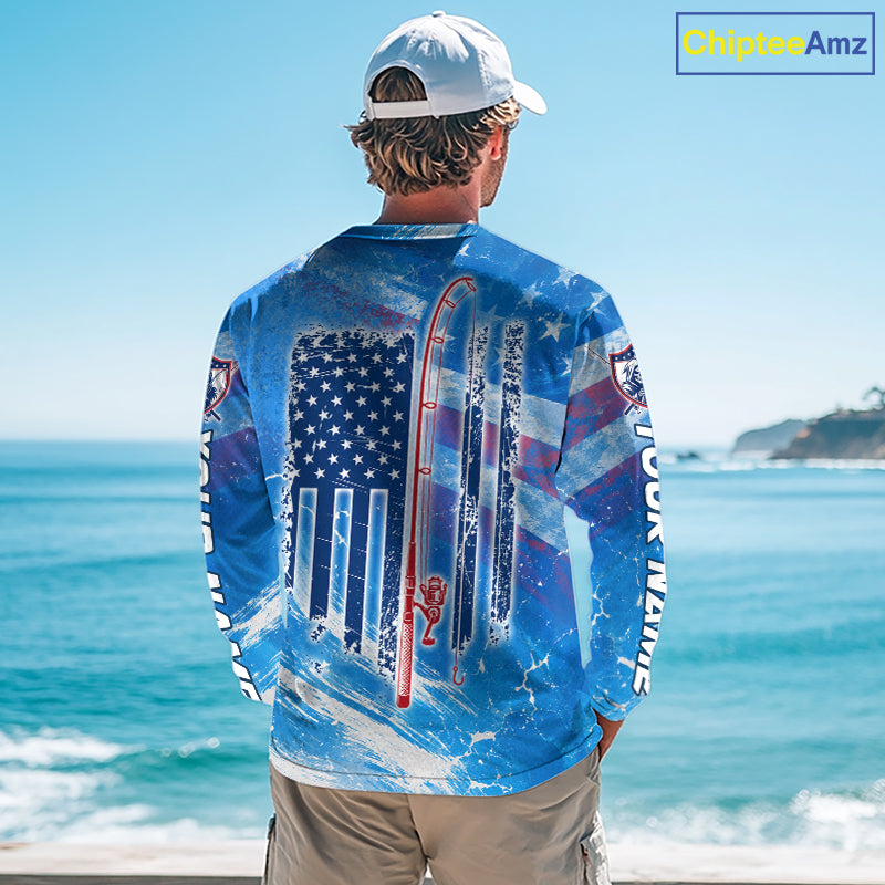 Man on a boat wearing a blue American flag marlin fishing shirt with custom name on the sleeves