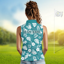 Load image into Gallery viewer, Woman wearing a teal sleeveless shirt with white floral pattern and 'TEAM NAME' text on a golf course.