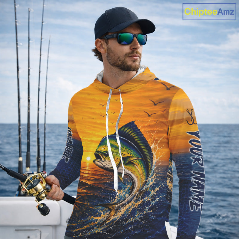 Angler wearing Mahi Mahi fishing sunset custom long sleeve hooded shirt on an offshore fishing trip