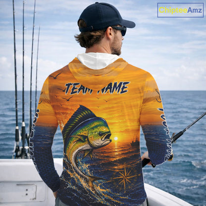 Angler wearing Mahi Mahi fishing sunset custom long sleeve hooded shirt on an offshore fishing trip - back view