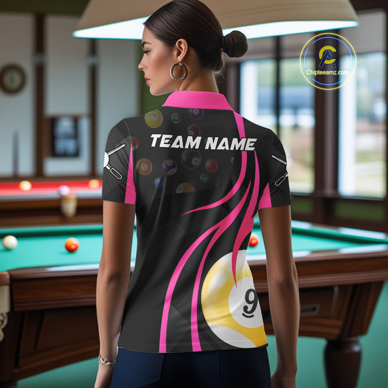 Back view of woman wearing a pink 8 ball and 9 ball pool shirt in a billiards hall.
