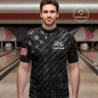 Man wearing a black American flag wings bowling quarter zip jersey during tournament play front view.
