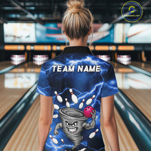 Load image into Gallery viewer, Back view of woman wearing a blue thunder lightning tornado bowling polo shirt inside a bowling alley.