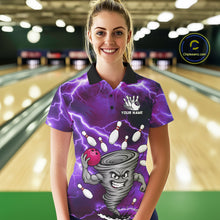 Load image into Gallery viewer, Woman wearing a purple thunder lightning tornado bowling polo shirt at a bowling alley front view.