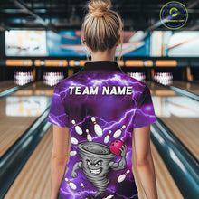 Load image into Gallery viewer, Back view of woman wearing a purple thunder lightning tornado bowling polo shirt inside a bowling alley.