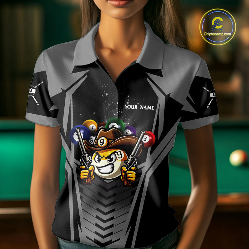 Woman wearing a grey 9 ball cowboy billiard jersey beside a pool table front view.