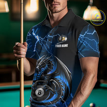 Load image into Gallery viewer, Man wearing a blue thunder lightning dragon 8 ball and 9 ball billiard jersey beside a pool table front view.