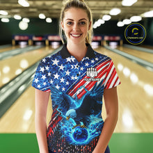 Load image into Gallery viewer, Woman wearing an American flag polo shirt with an eagle design in a bowling alley, holding a bowling ball.