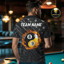 Load image into Gallery viewer, Man wearing a black billiard shirt with a 8 ball and 9 ball pool ball design and 'Team Name' text in a bar setting.