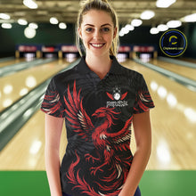 Load image into Gallery viewer, Woman wearing black and red phoenix wings bowling polo shirt front view.