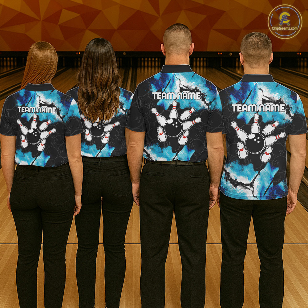 Back view of bowling team wearing matching dreamy blue bowling shirts in a bowling alley.
