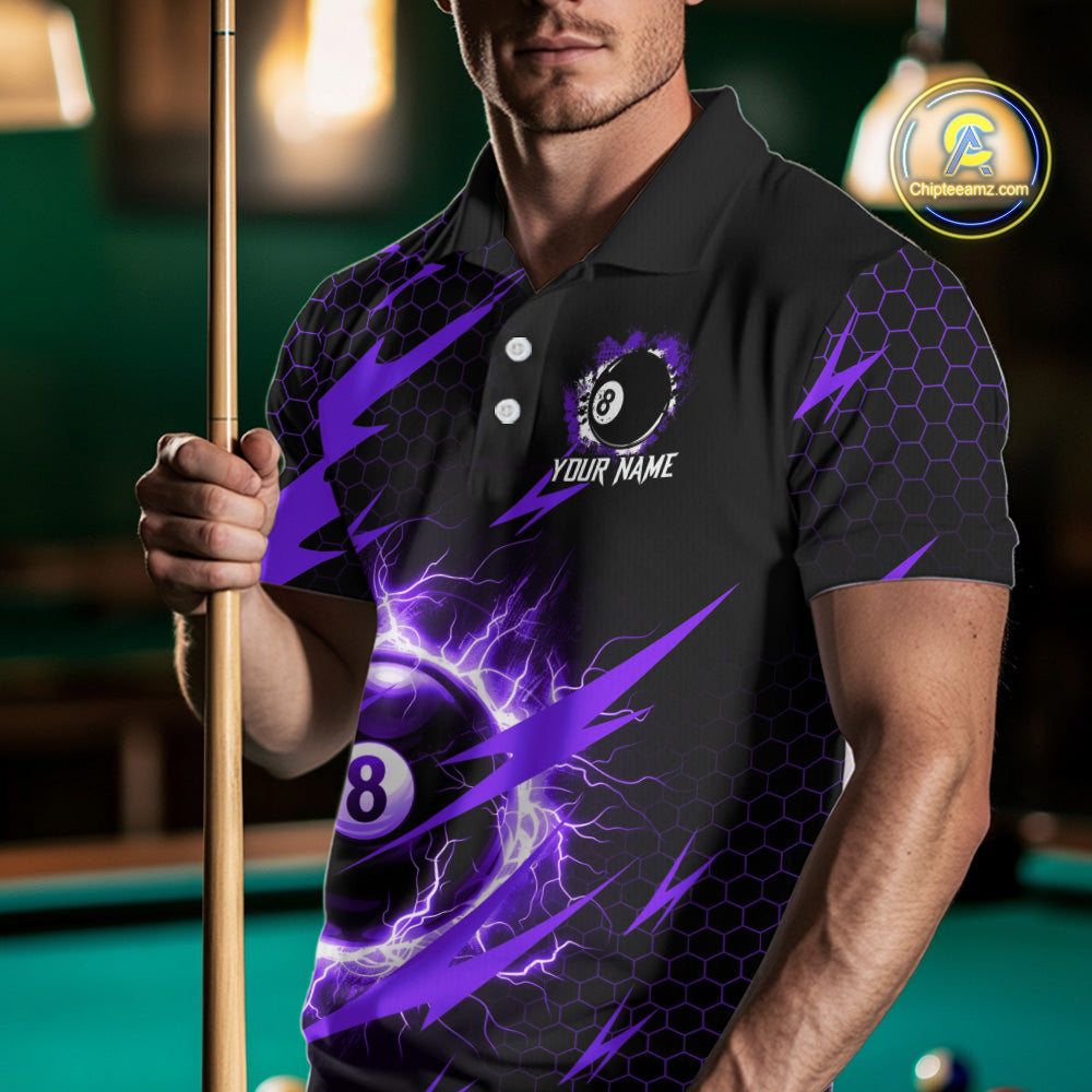 Man wearing a purple 8 ball thunder lightning billiard jersey beside a pool table front view.
