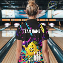 Load image into Gallery viewer, Back view of woman wearing a colorful lemon bowling polo shirt inside a bowling alley.