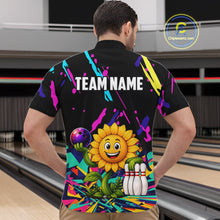 Load image into Gallery viewer, Back view of man wearing a colorful sunflower bowling quarter zip shirt in a bowling alley.