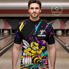 Load image into Gallery viewer, Man wearing a colorful bowling shirt with a bee graphic in a bowling alley.
