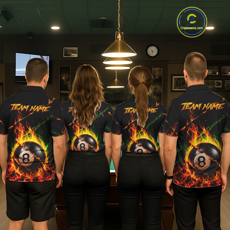 Back view of pool players wearing matching crack fire flame 8 ball billiard shirts in a game room.