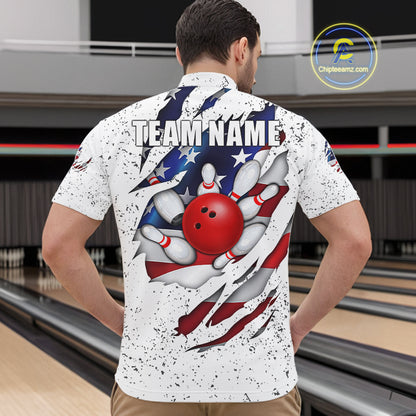 Back view of man wearing a white grunge American flag eagle bowling quarter zip shirt in a bowling alley.