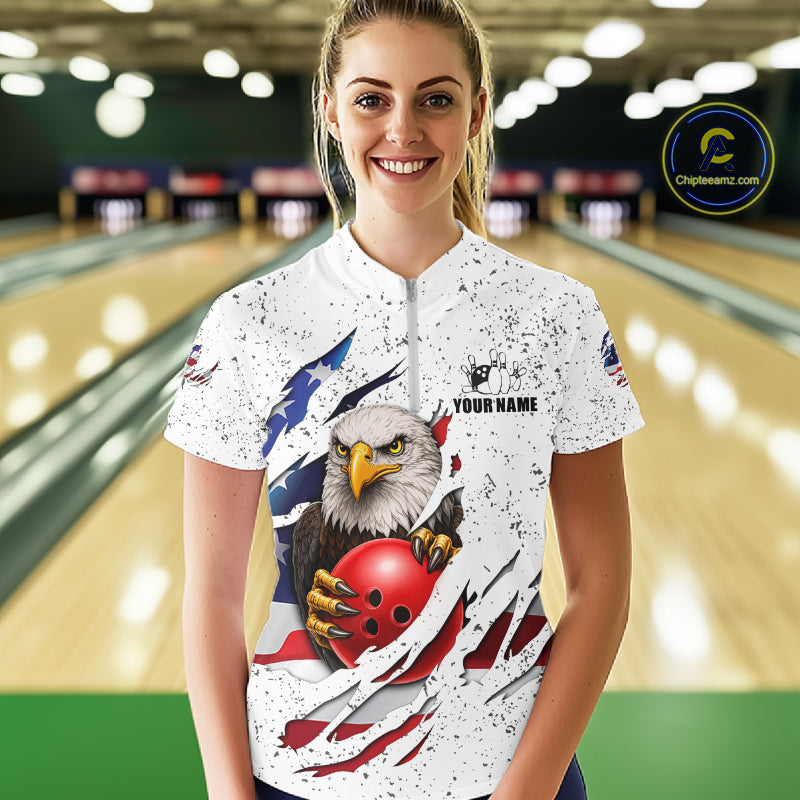 Woman wearing a white grunge American flag eagle bowling quarter zip jersey during league competition front view.