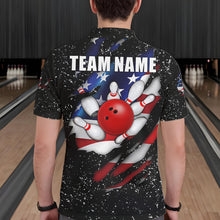 Load image into Gallery viewer, Back view of man wearing a black grunge American flag eagle bowling polo shirt inside a bowling alley.