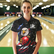Load image into Gallery viewer, Woman wearing a black grunge American flag eagle bowling polo shirt at a bowling alley front view.