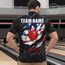 Load image into Gallery viewer, Back view of man wearing a black grunge American flag eagle bowling quarter zip shirt in a bowling alley.