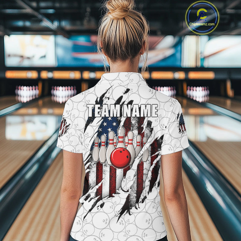 Back view of woman wearing a vintage American flag white bowling polo shirt inside a bowling alley.