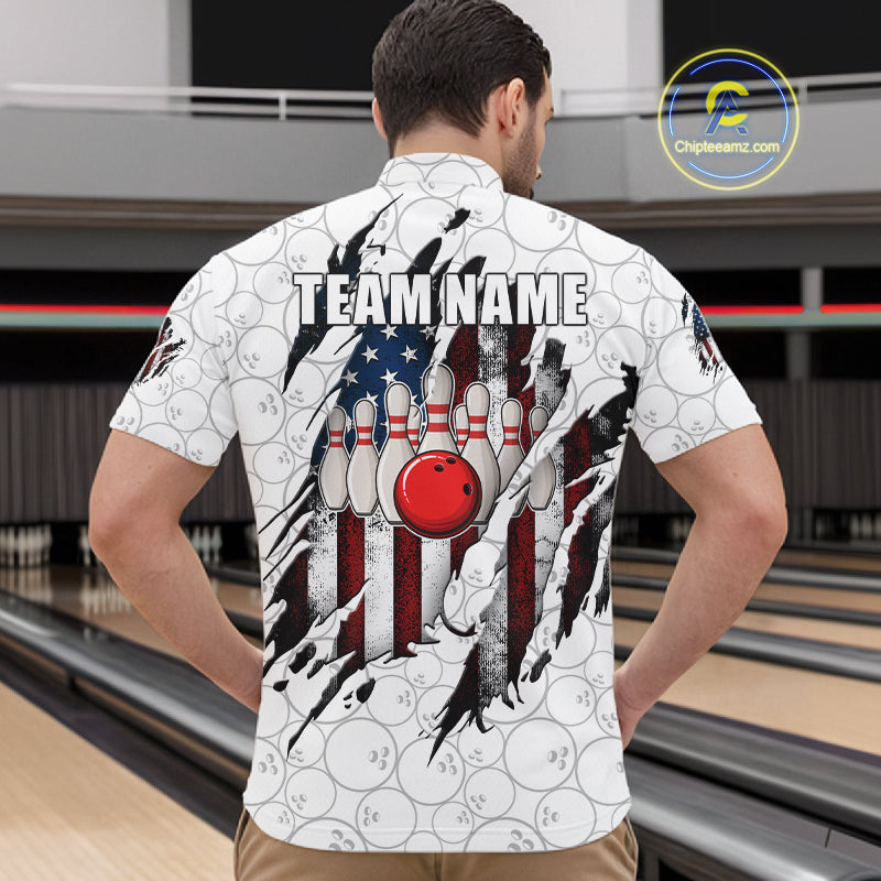 Back view of man wearing a vintage American flag white bowling quarter zip shirt in a bowling alley.