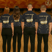 Load image into Gallery viewer, Back view of bowling team wearing matching tribal bowling shirts in a bowling alley.